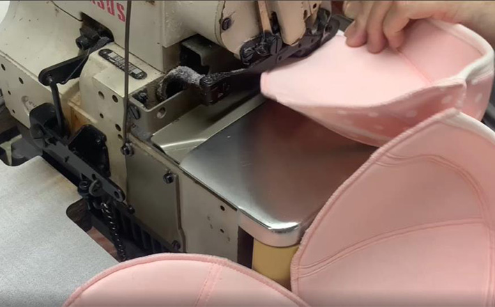 Overlock stitch attach fabric on foam cup